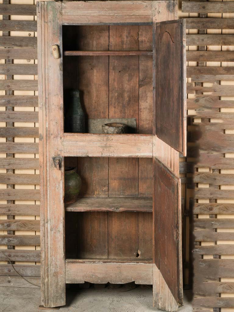 Weathered wooden latch closure cabinet