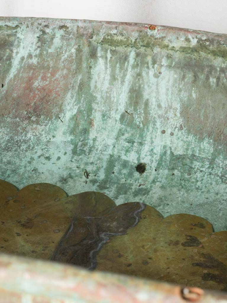 Oxidized wrought-iron floral stand