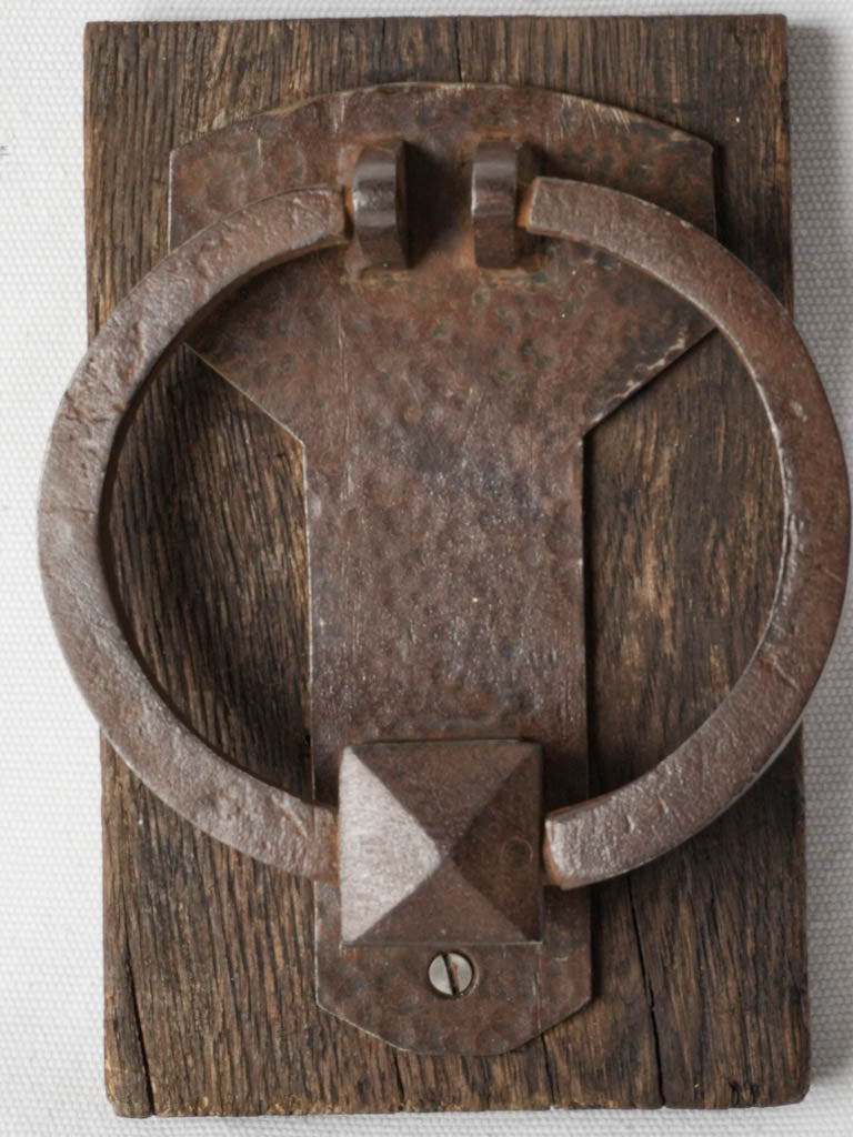 Textured hammered iron door accent