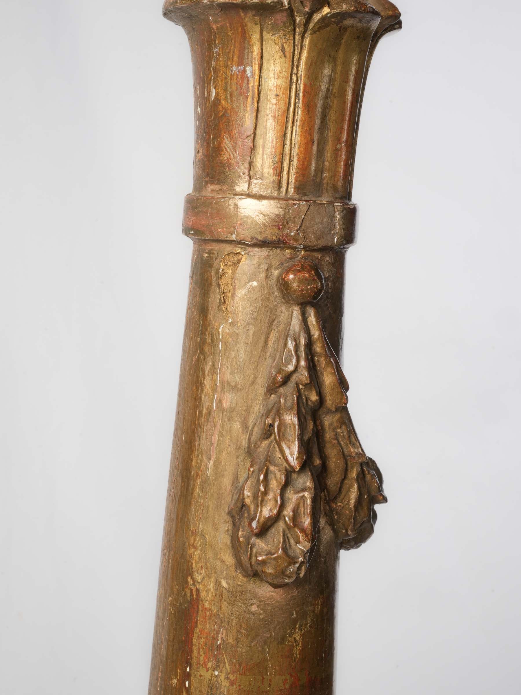 Elaborate carved torchère