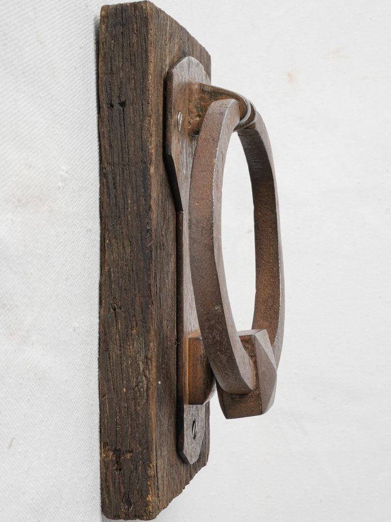 Aged wrought iron door knocker accessory