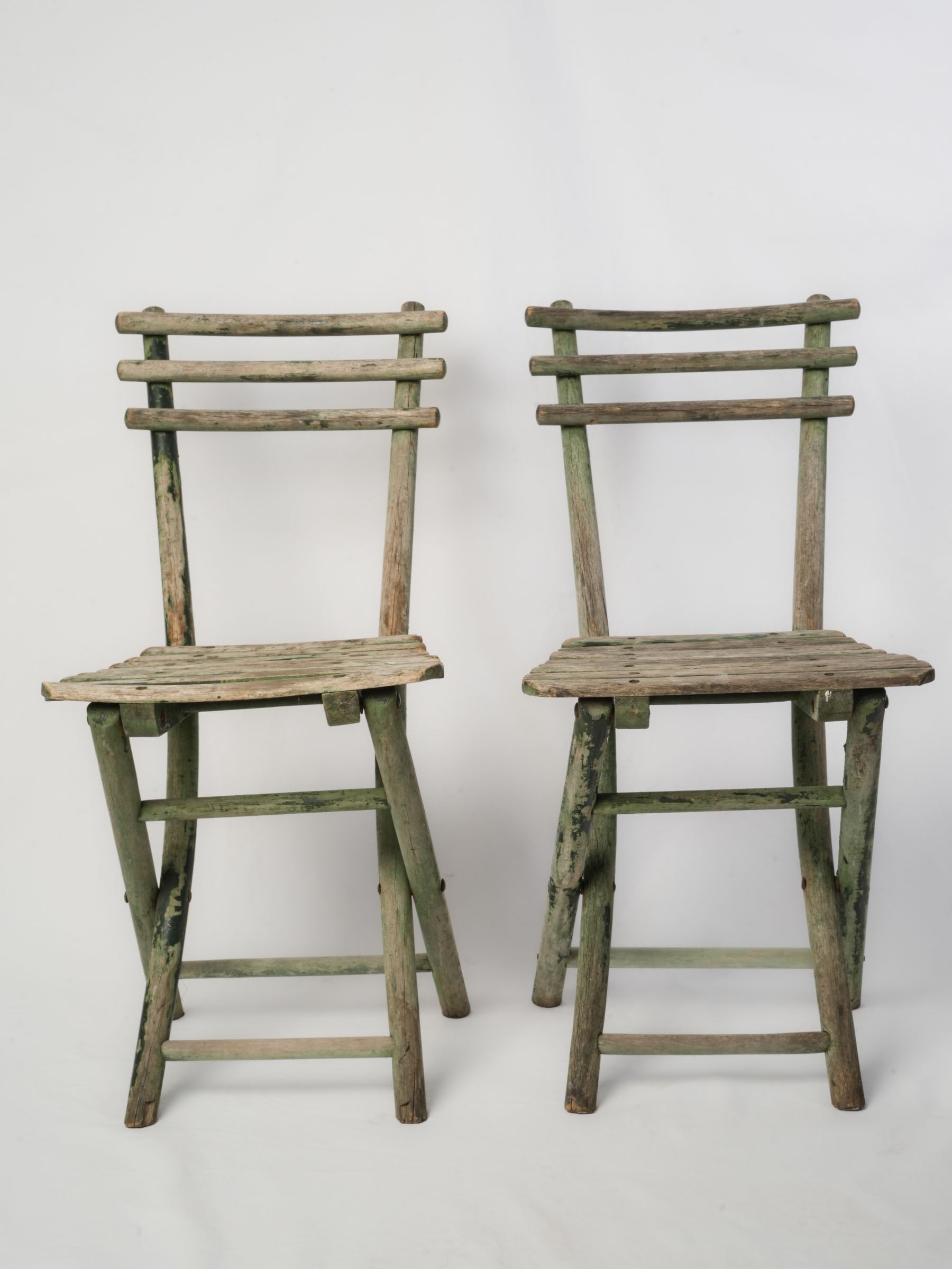 Faded green vintage Thonet chairs