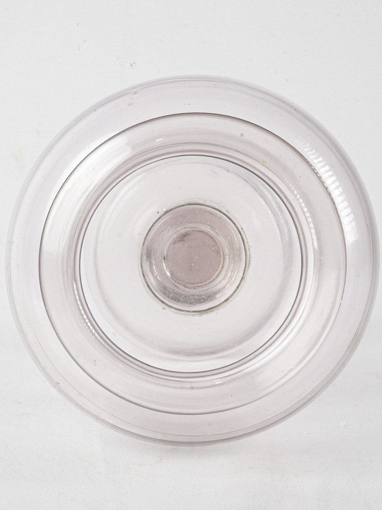 Authentic pedestal base glass container