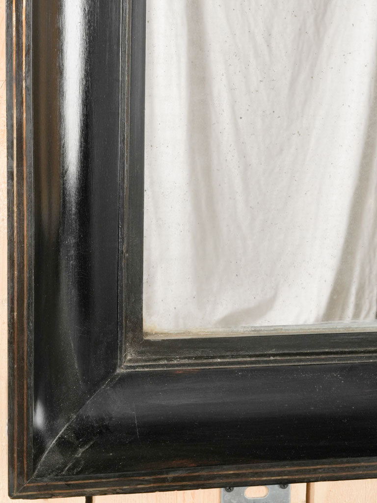 Elegant, antique beveled wall mirror