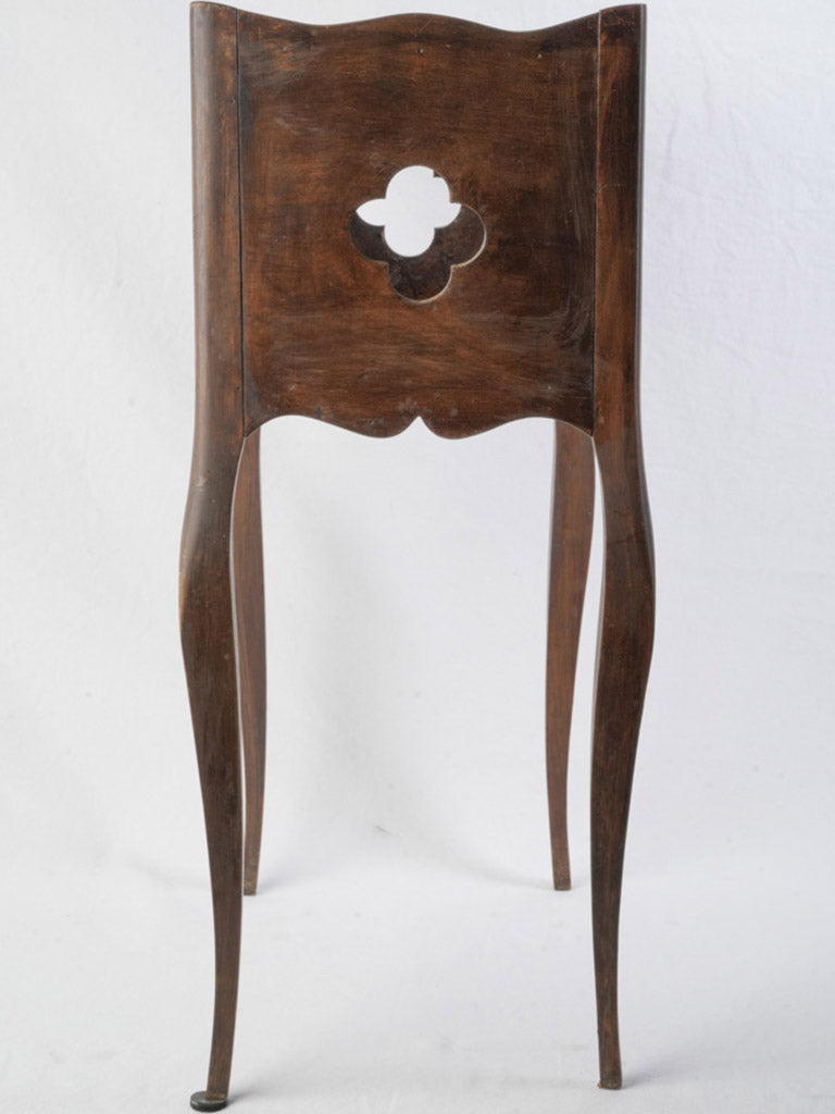 Petite carved floral bedside stand