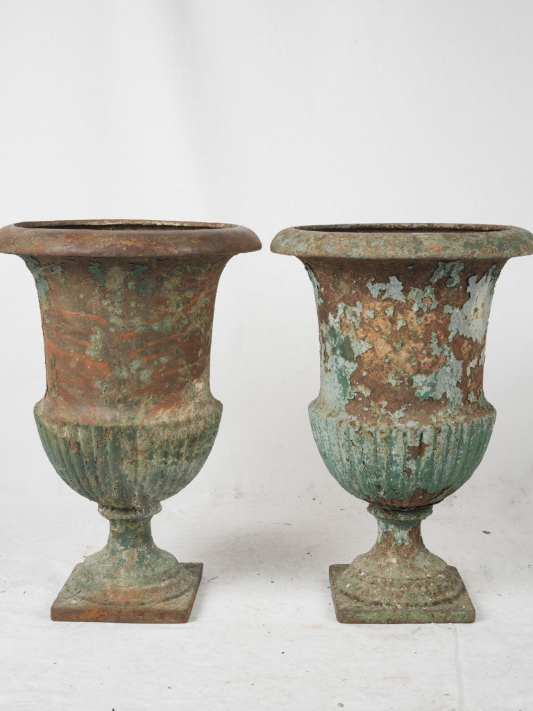 Aged French urns, charming patina