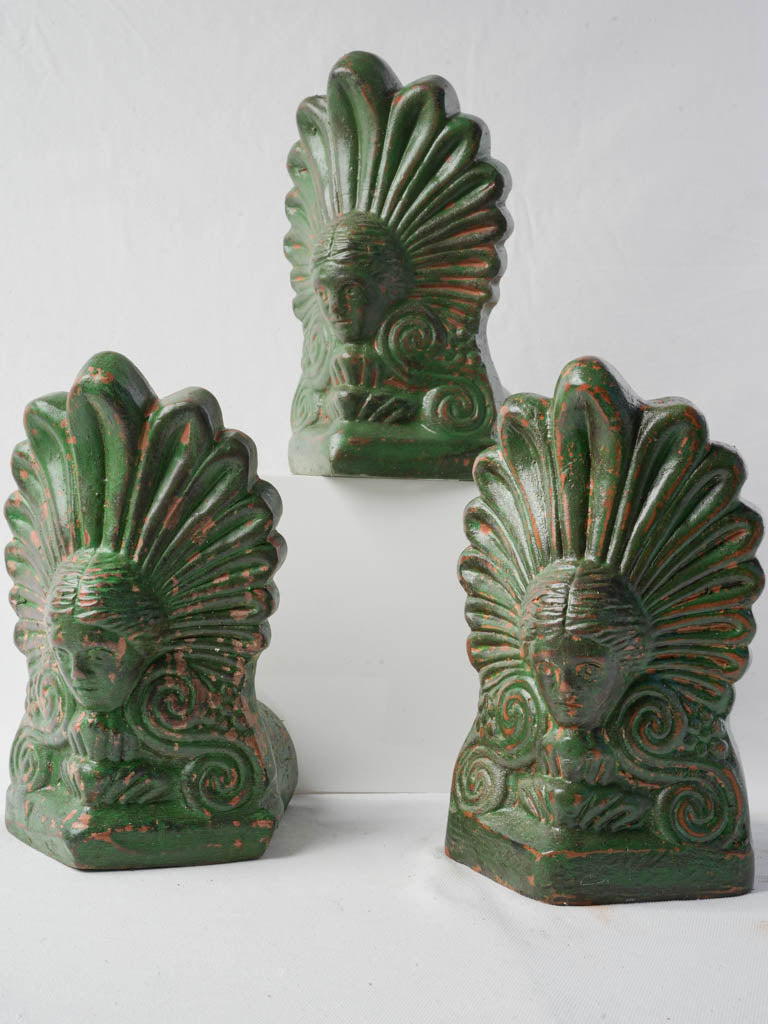 Stylized female bust finials