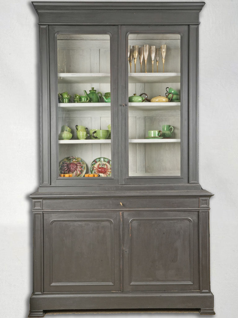 Sophisticated black glass door cabinet