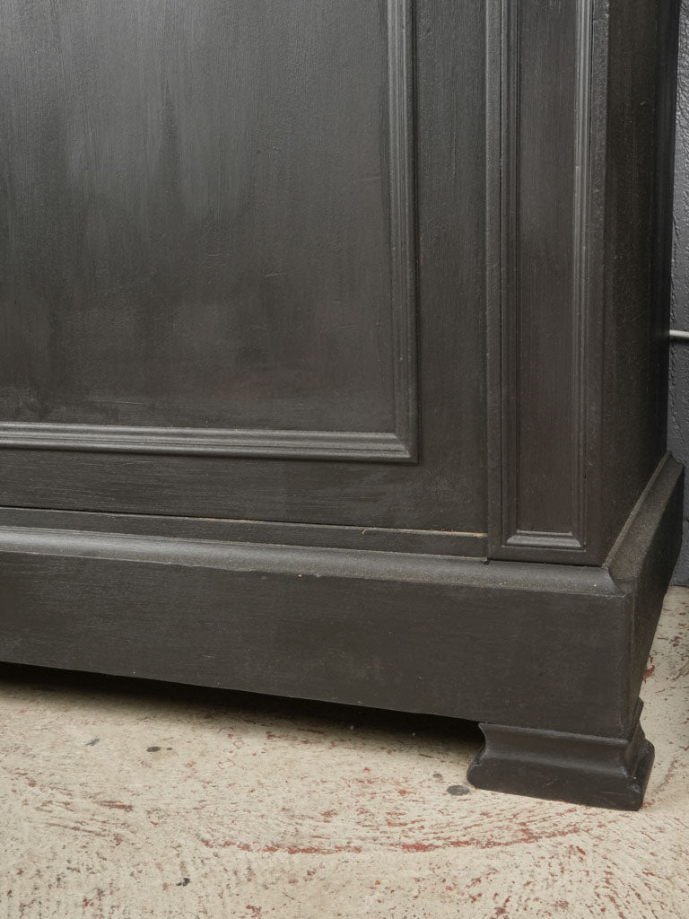 Grounded, solid lower storage cabinet