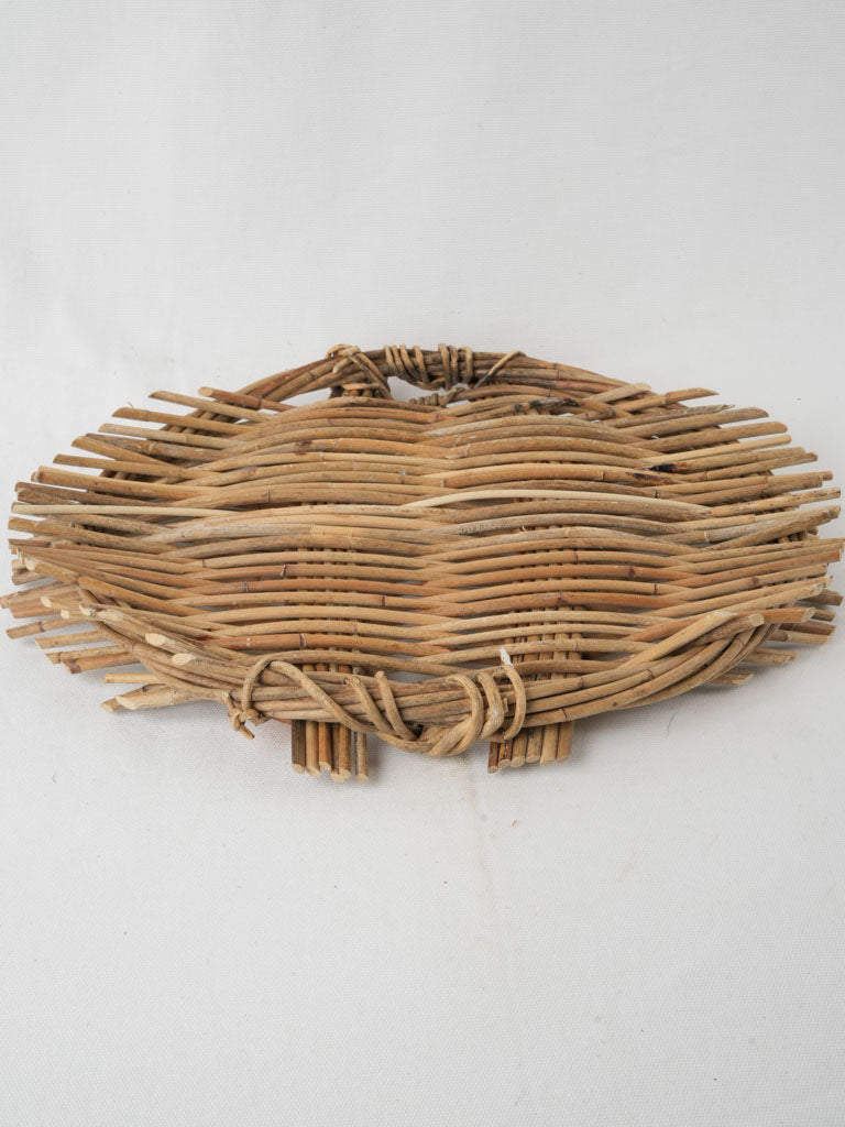 Aged oval wicker serving platter