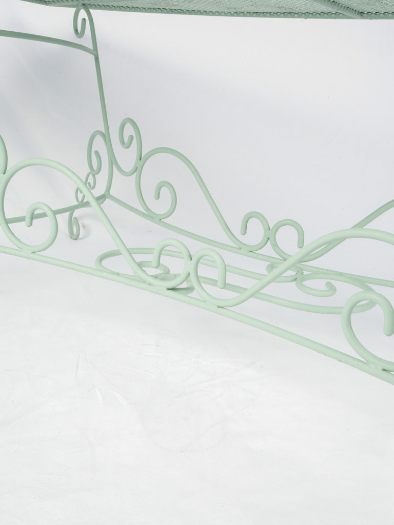 Elegant wrought iron al fresco table