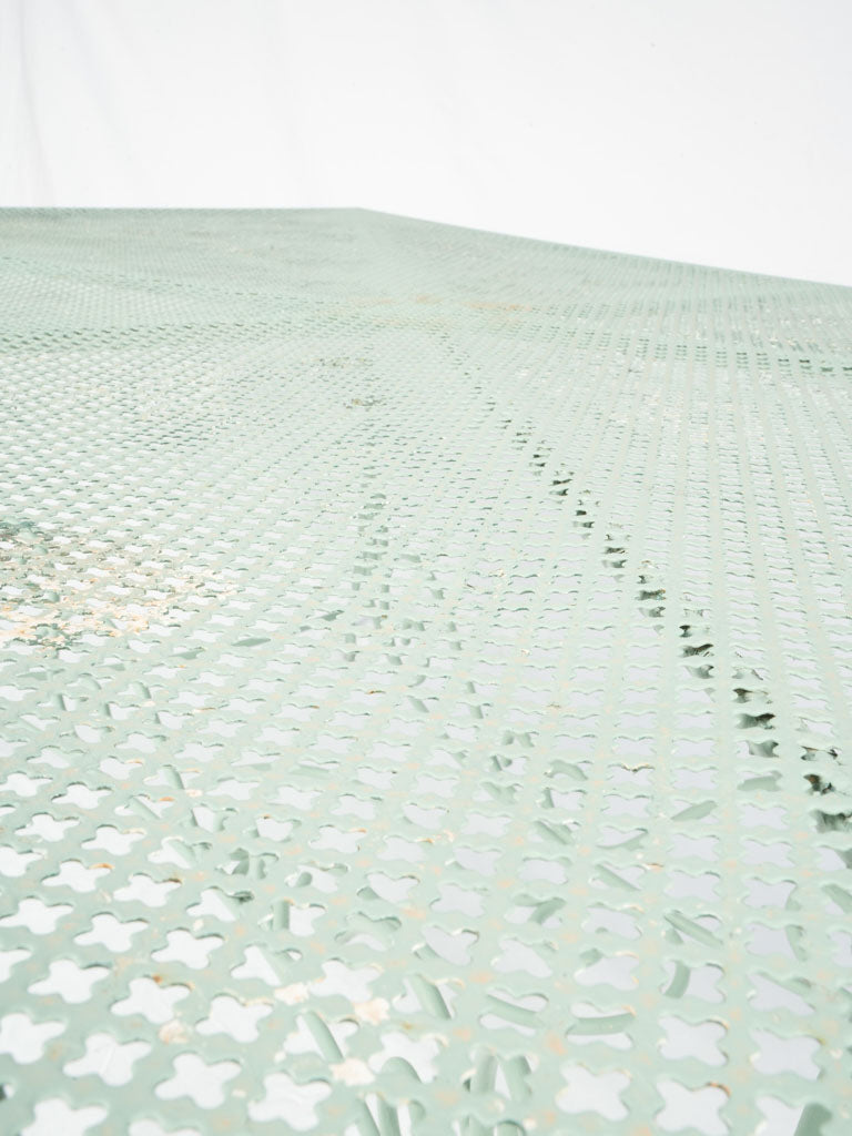 Delicate perforated mid-century garden table