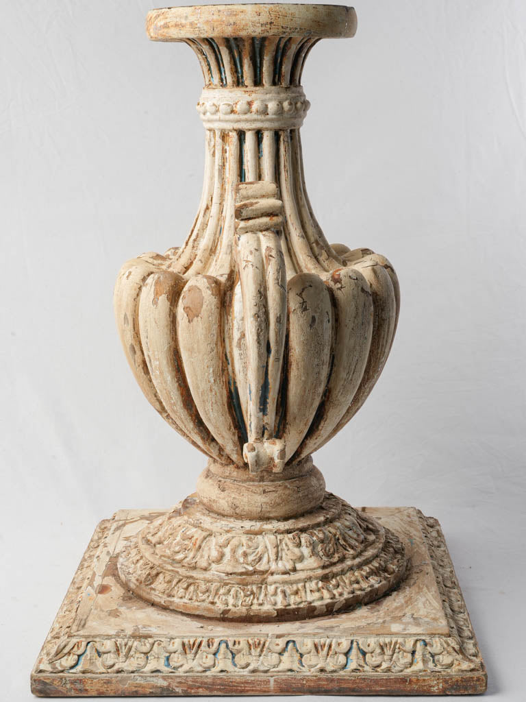 Graceful carved reliefs stand