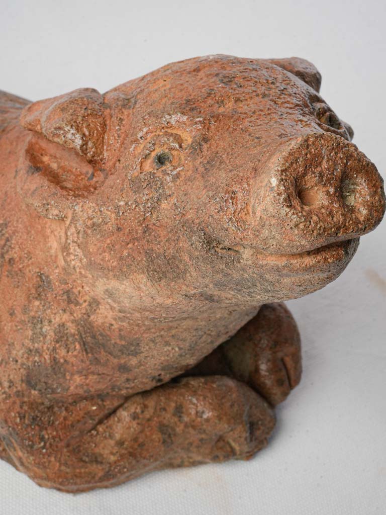 Subtle soft-sculpted pig figurine