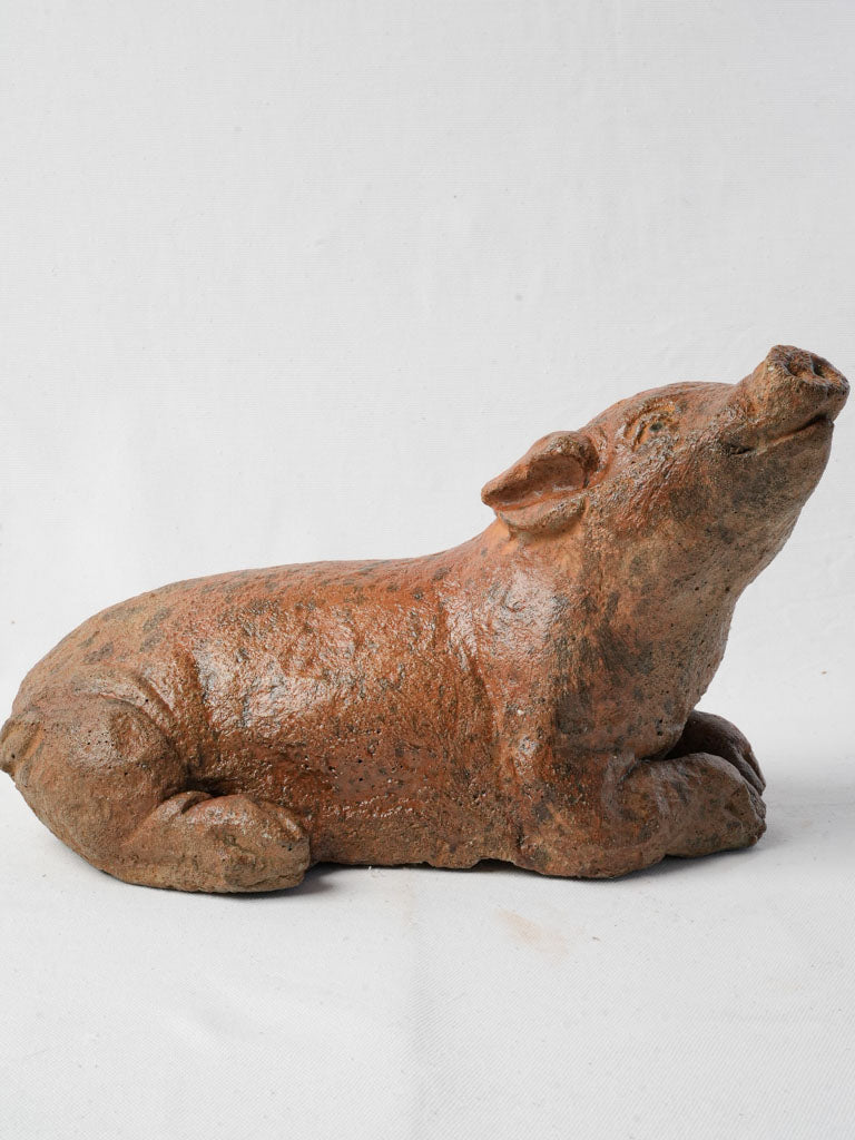 Playful aged pig garden accent
