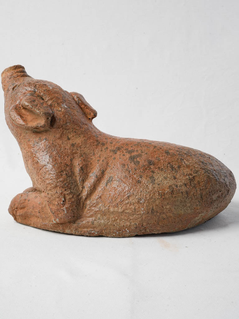 Naturalistic terracotta pig display