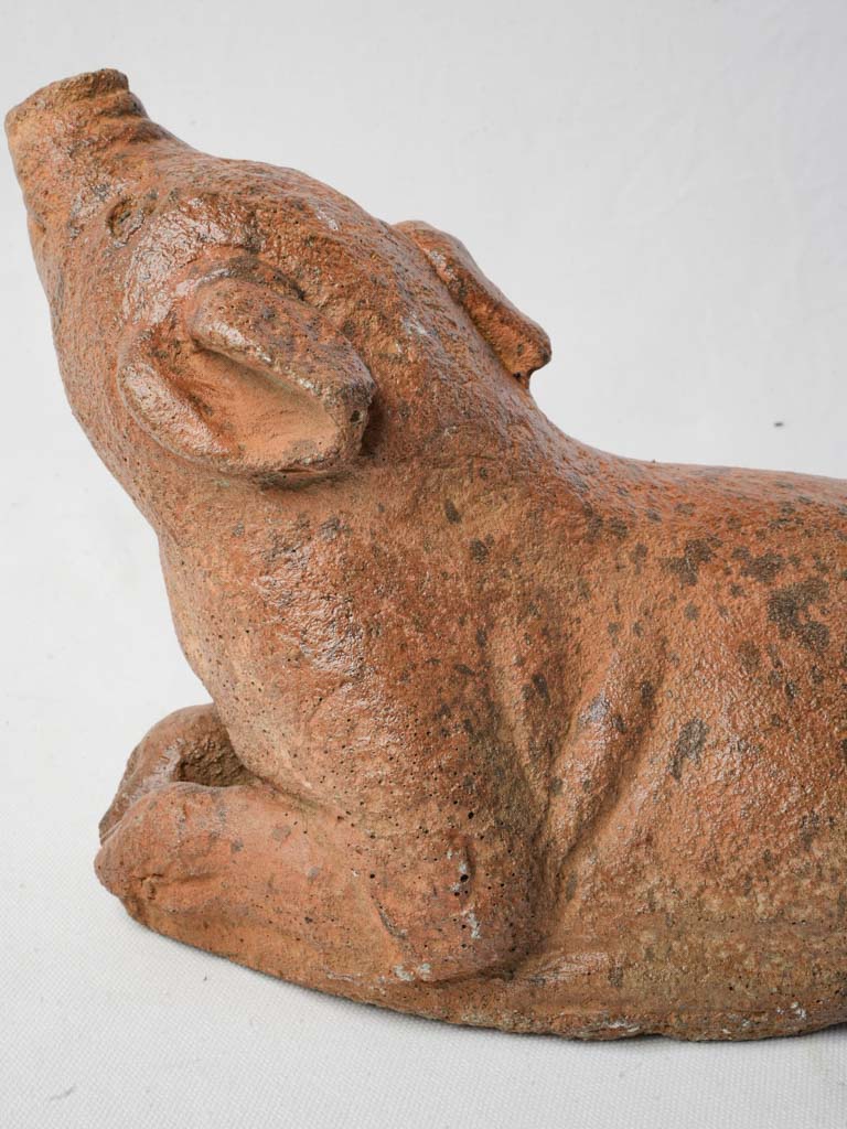 Earthy reconstituted stone pig