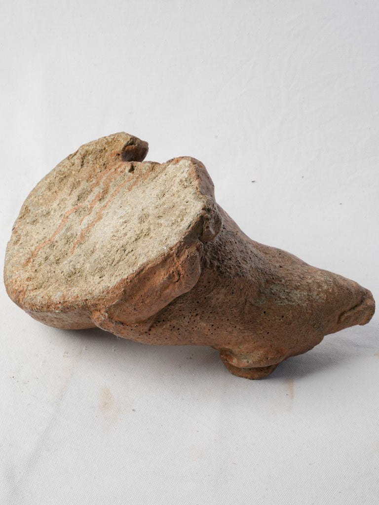 Lighthearted reconstituted stone pig