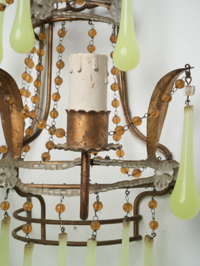 Historical bronze-finished lighting sconces