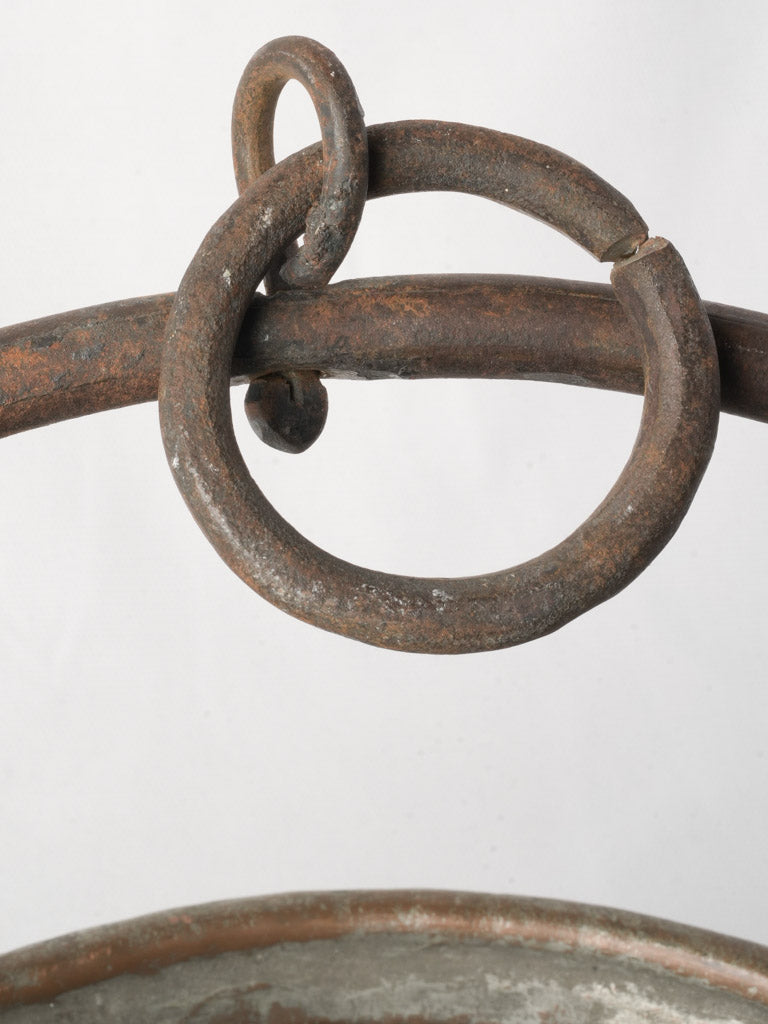 Verdigris marked rustic cauldron