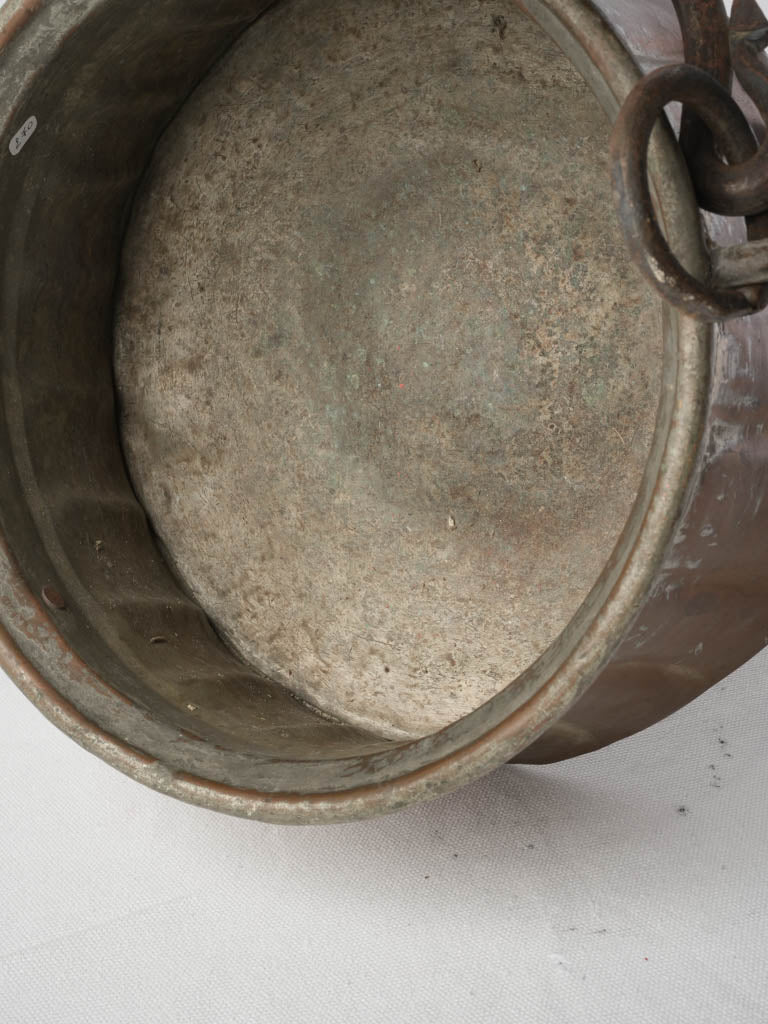 Artisanal ironwork copper vessel