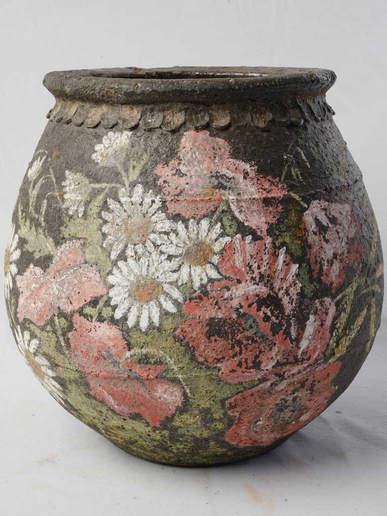 Rustic terracotta jar with petals