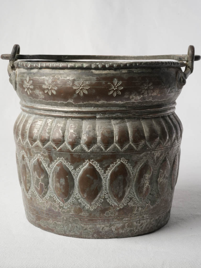 Mediterranean embossed copper vessel