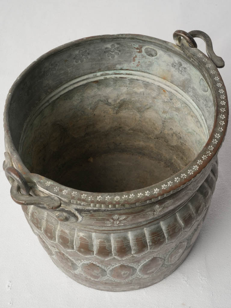 Timeworn detailed copper accessory