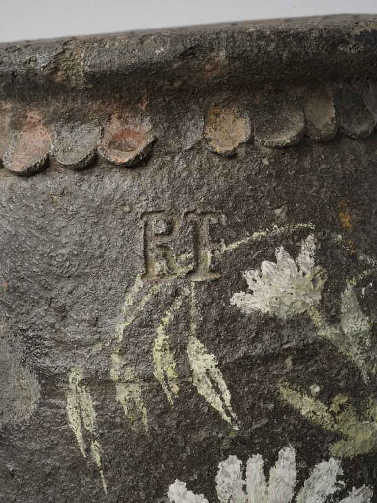 Timeworn pottery with vibrant floral art