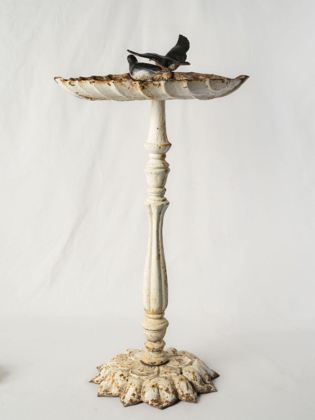 Graceful midcentury birdbath design