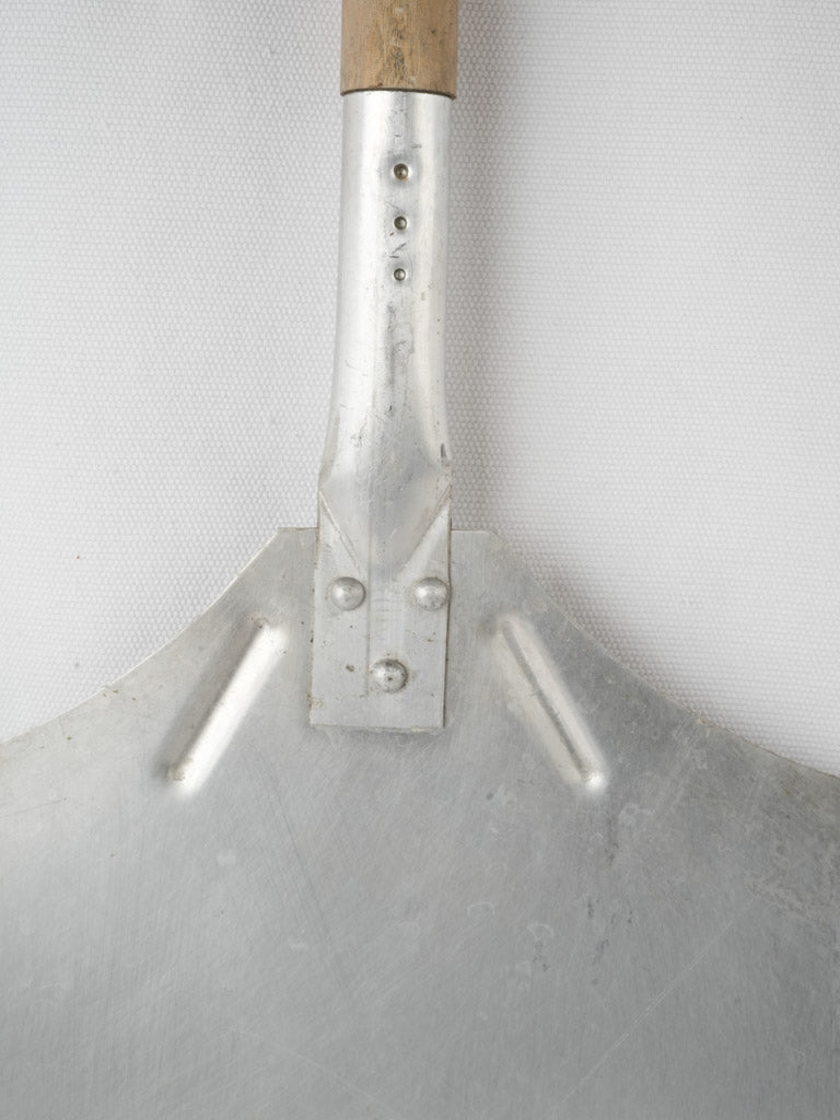 Vintage wooden-handled pizza peel