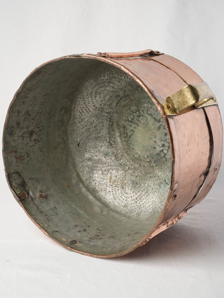 Character-filled antique copperware