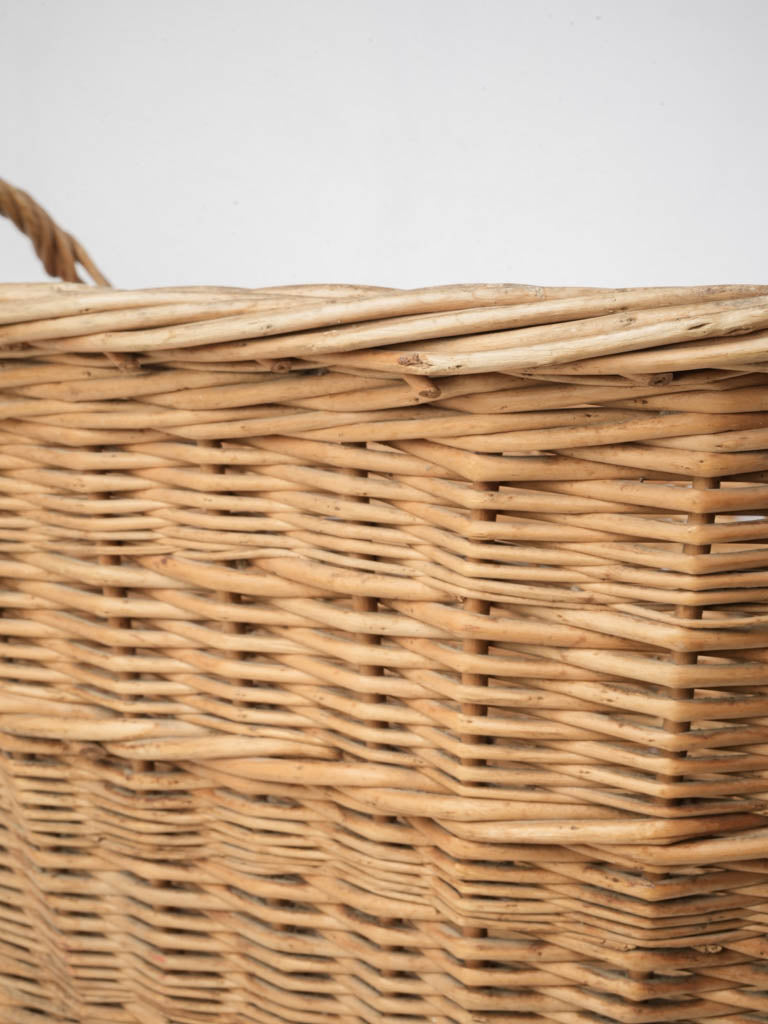 Twisted handle woven basket