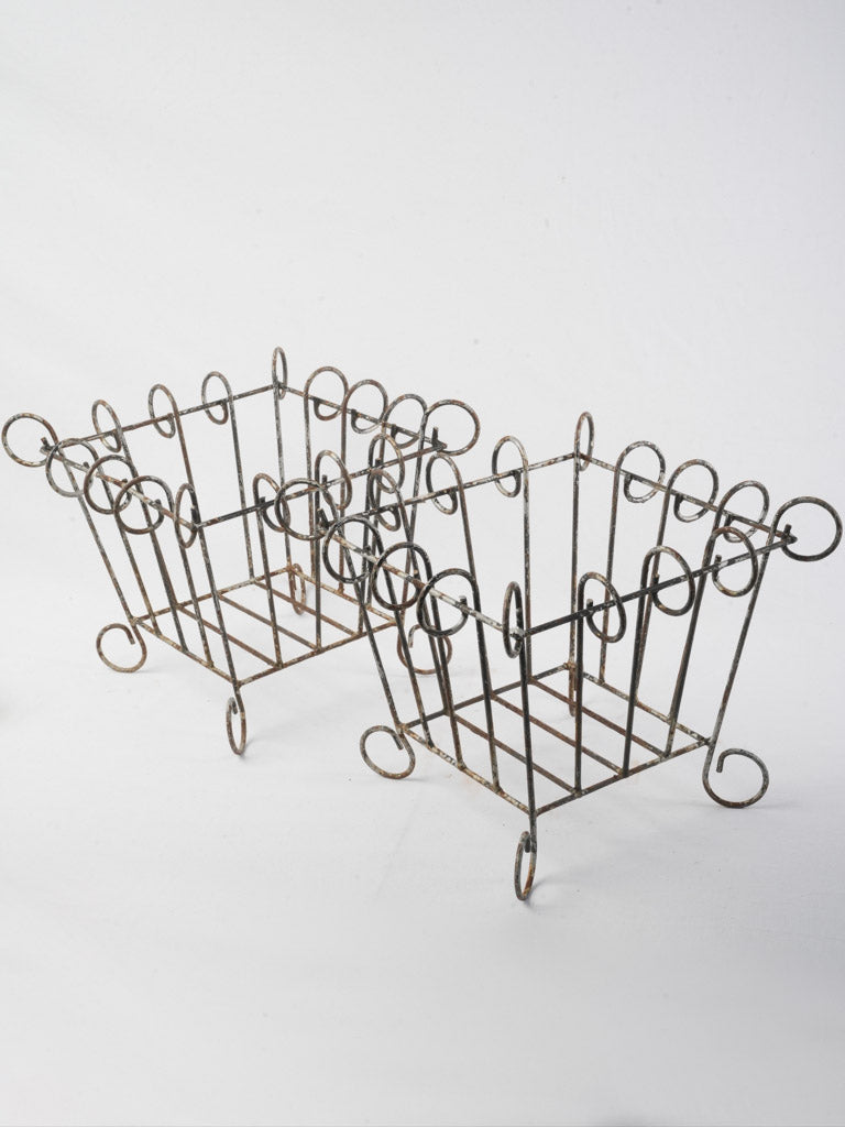 Rustic aged wrought iron jardinières
