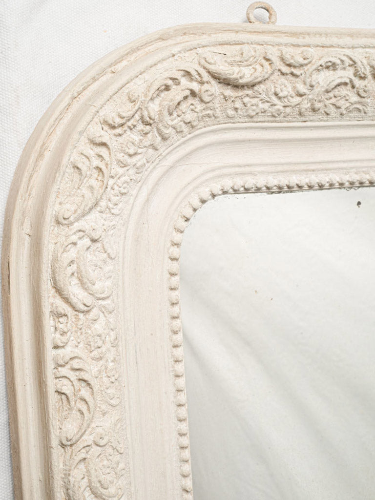 Foxed glass French mirror