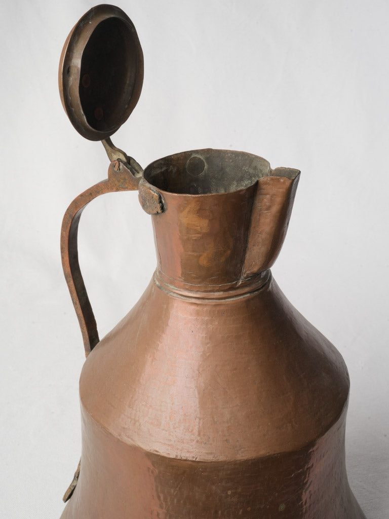 Distinctive aged copper drinkware piece