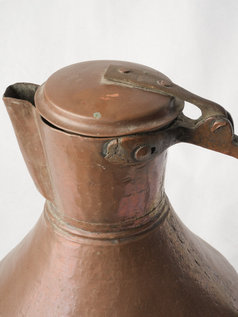 Sculptural ornate copper coffee ewer