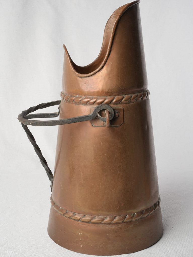 Sculptural warm-toned coal vessel