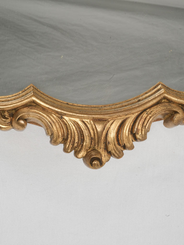 1950s ornate gold accent wall mirror