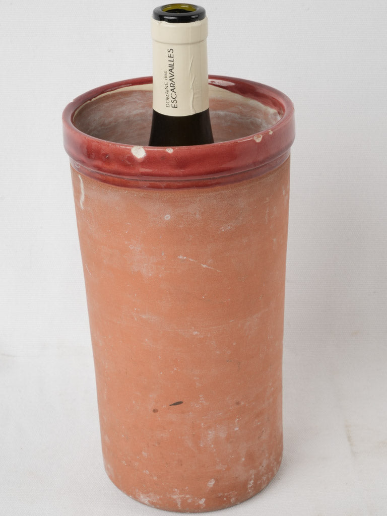 Evocative, porous terracotta wine cooler