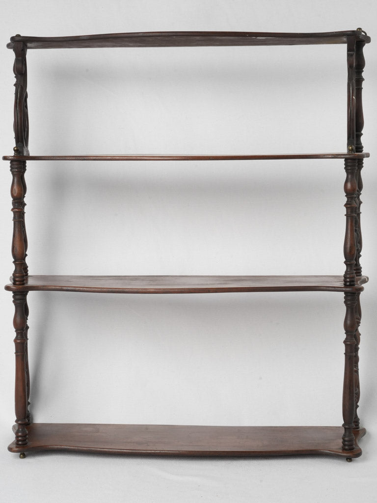 Antique bow-front French craftsmanship shelves