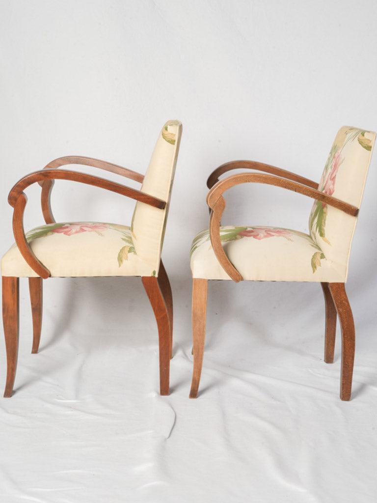 Timeless sculptural mahogany armchairs