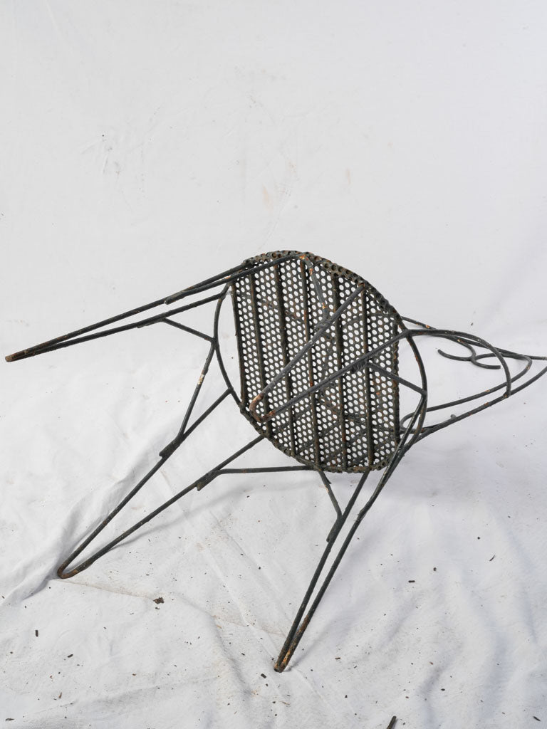 Rustic wrought iron outdoor seating  