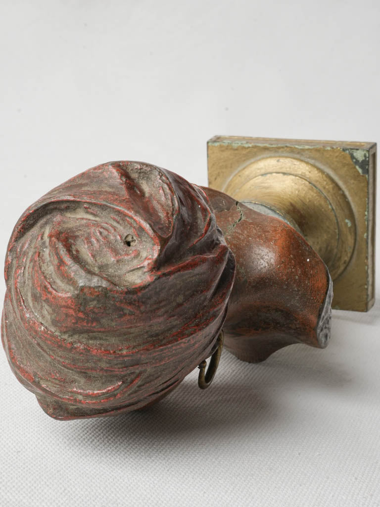 Textured terracotta-inspired figure