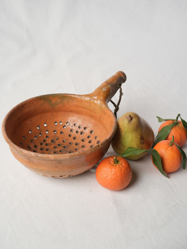 Antique glazed terracotta colander