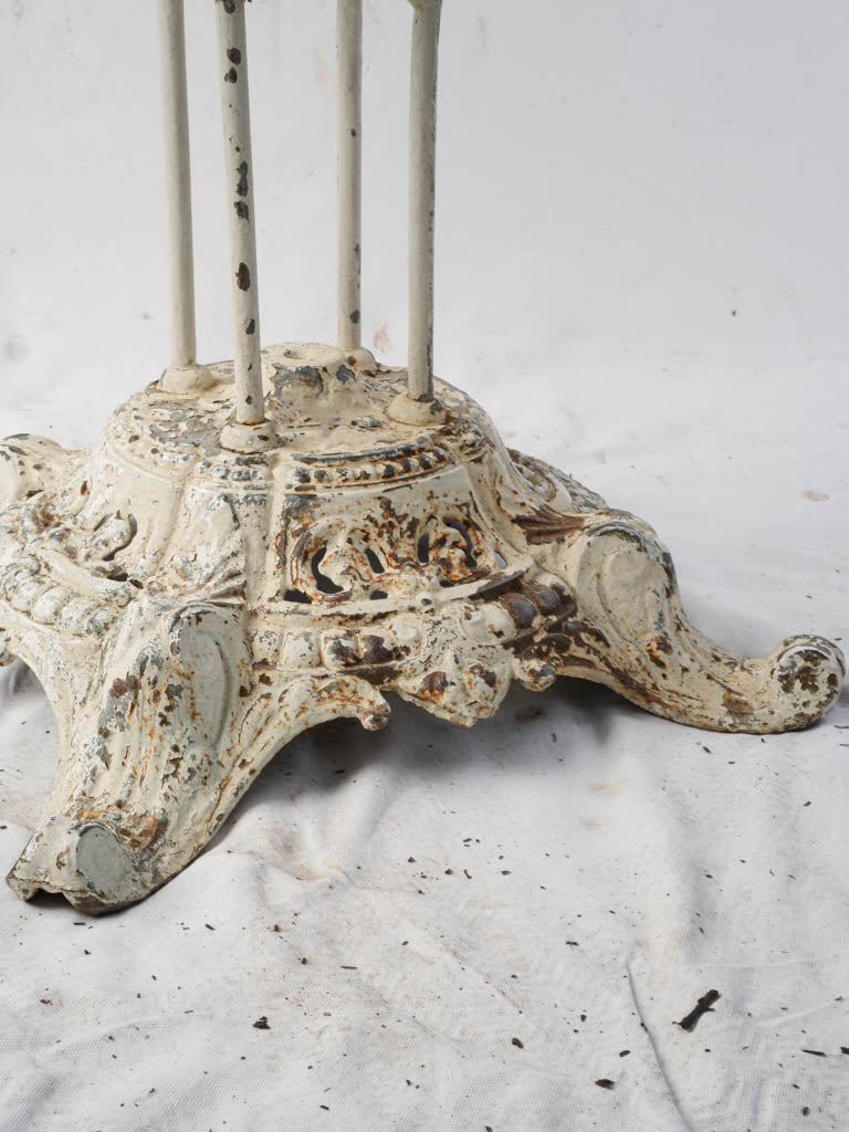 Worn paint cast iron guéridon  