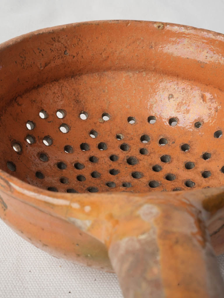 Honey-toned vintage colander