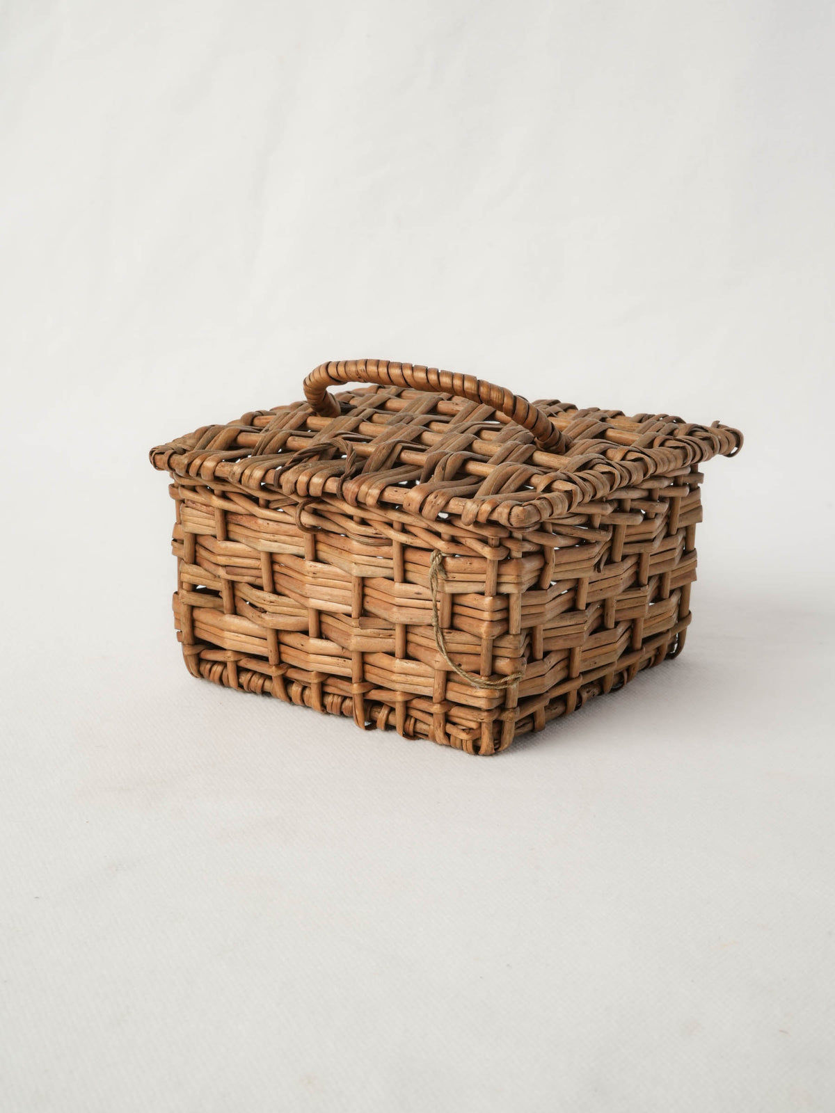 Small vintage wicker trinket box