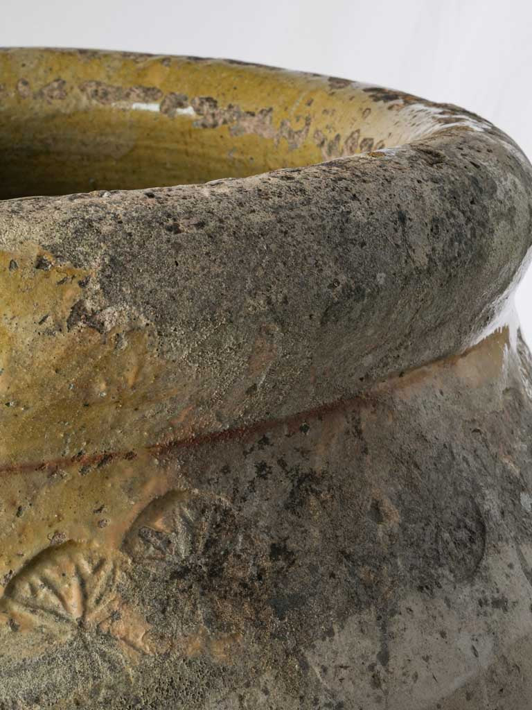 Provincial handcrafted pottery with repairs