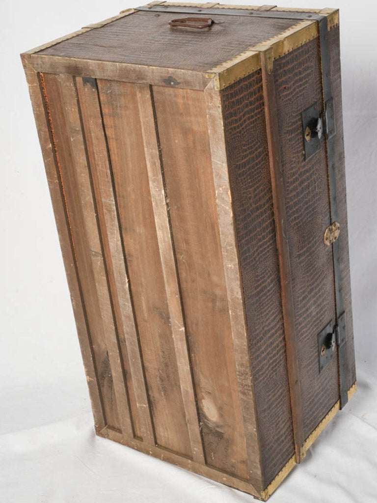 Handsome brass-toned corner trunk